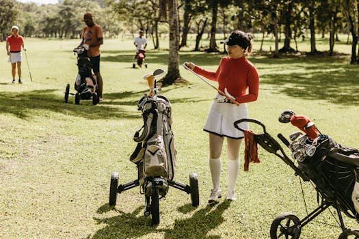 A woman in sportswear playing golf with others, enjoying a sunny day outdoors.